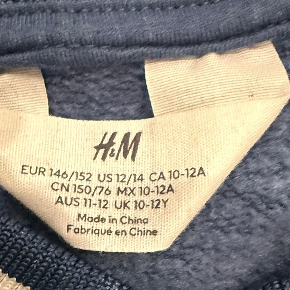 H&M Blue New York Varsity Jacket with White Lettering, includes the Cubs ball.
